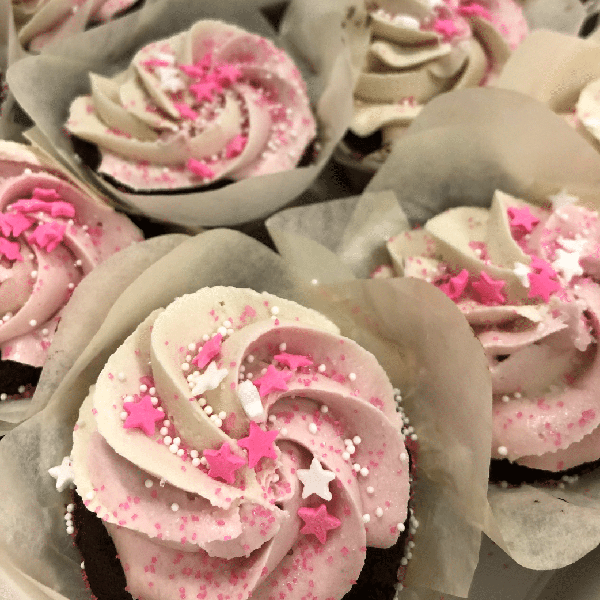 Custom decorated pink vegan cupcakes